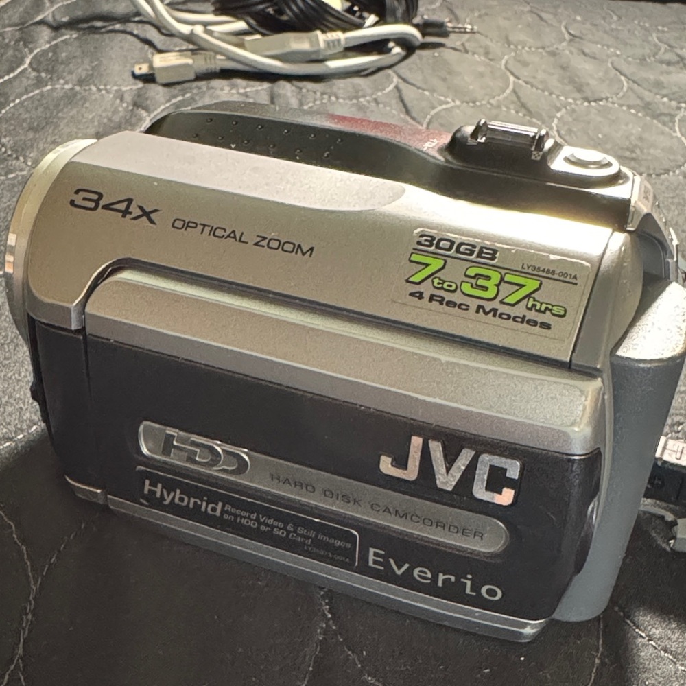 JVC Everio Hybrid Camcorder with 34x Optical Zoom works great can use for parts